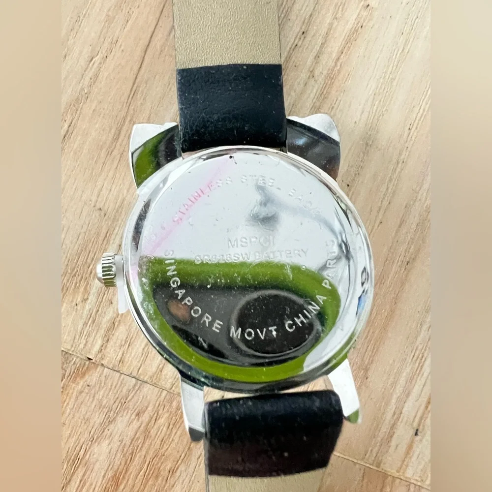 Unbranded ladies silver tone cat watch NEW BATTERY
